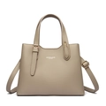 Detailed macro of khaki lychee grain leather tote bag with gold metal buckle and handle - Apricot