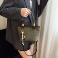 Minimalist military green canvas tote bag with round handles and adjustable strap - Green