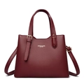 Deep red lychee texture tote bag with gold hardware and detachable strap on white background - Red