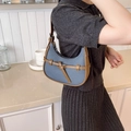Minimalist crescent shoulder bag in denim blue and brown faux leather with buckle detail - Blue