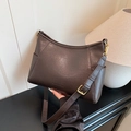 Chic dark brown matte leather handbag with adjustable shoulder strap and gold hardware - Brown
