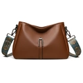 Brown litchi leather crossbody bag with ethnic wide strap and metal hardware - Brown