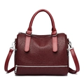 Vintage burgundy Boston handbag with woven texture and adjustable shoulder strap - Burgundy