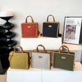 Minimalist canvas tote bags in five colors with leather trim and adjustable straps - Off White