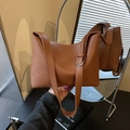 Brown litchi texture shoulder bag with adjustable strap and silver-toned hardware - Brown