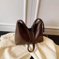 Dark brown hobo bag in lychee texture leather for stylish commuting wear - Brown