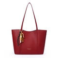 Red lychee textured tote bag with a colorful beaded tassel and golden leather logo - Red