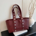 Chic burgundy oversized tote bag with silver studs and textured leather finish - Burgundy