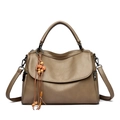 Classic khaki faux leather Boston bag with wooden bead tassel and adjustable strap - Khaki