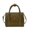Retro dark green leather shoulder bag with gold metal clasp on white background - Green