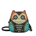 Colorful owl crossbody bag with vibrant pop art patterns and adjustable leather strap - Green