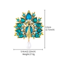Broche paon vintage dorée avec cristaux bleu vert et pendentif en perle blanche - Paon Rétro Doré Pierre Bleue Verte Perle (XD825214)
