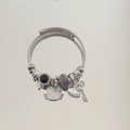 Silver woven bracelet featuring Hello Kitty charm and sparkling heart key pendant - Blue Cartoon Cat Bracelet