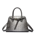 Grey crocodile embossed leather handbag with gold buckle and trapezoid shape - Gray