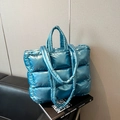 Quilted blue metallic down tote bag with dual straps and glossy padded texture - Blue
