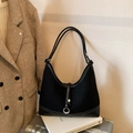 Minimalist black underarm bag with contrast stitching and silver ring buckle detail - Black