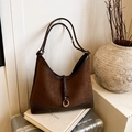 Classic dark brown suede hobo bag with sleek leather straps and metal ring accent - Brown