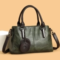 Retro deep green oil wax leather tote bag with brown handles and silver hardware - Green