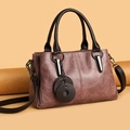Retro reddish brown tote bag with pebble leather texture and dark brown handles - Purple