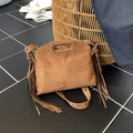 Brown suede tassel shoulder bag with a vintage bohemian design and hollow handle - Brown