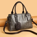 Retro grey oil-wax texture tote bag with brown handles and elegant metal ring buckle - Gray