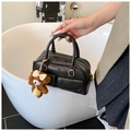 Fashionable black Boston handbag with twin front pockets and a cute plush bear charm - No Pendant / Black