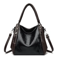Large capacity tote bag in black and brown oil-wax leather with adjustable shoulder strap - Black