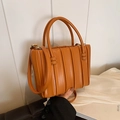 Chic orange pleated handbag with cylinder handles and adjustable shoulder strap for women - Brown