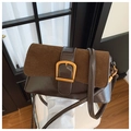 Vintage brown shoulder bag with suede flap and gold buckle detail on a minimal background - Brown