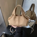 Camel suede crossbody bag with soft pleats and golden metal buckles in a mirror view - Khaki