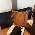 Brown vintage leather shoulder bag with gold clasp and wooden bead charm accessory - With Pendant / Brown