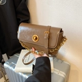 Vintage brown oil wax leather shoulder bag with gold twist lock and chain strap for women - Brown