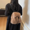 Brown faux fur backpack detail showing soft plush texture and black drawstring closure - Dark Brown