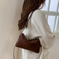 Minimalist dark brown suede shoulder bag featuring a sleek vintage silhouette for women - Brown