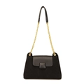 Elegante bolso bandolera acolchado negro con cadena dorada y textura de terciopelo - Negro