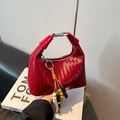 Red woven leather handbag with colorful beads and silver buckle on a clean studio background - Red with Pendant