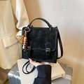 Retro black crossbody bag with matte texture, dual buckles, and vintage wooden bead charm - No Pendant / Black