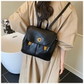 Minimalist black large capacity backpack with textured lychee grain leather and gold buckle - Black