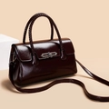 Deep burgundy leather handbag with woven handles and silver metallic twist lock at 45-degree angle - Brown