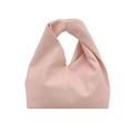 Minimalist pink dumpling handbag with a unique knotted handle and pleated texture design - Pink