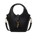 Minimalist black lychee pattern leather bucket bag with gold ring and knot pendant - Black