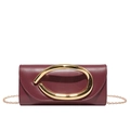Burgundy leather crossbody bag with gold oval handle and chain strap for evening events - Red