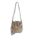 Chic beige drawstring bucket bag with woven straps, star pendant and tassel accents - Khaki