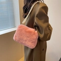 Chic pink plush crossbody bag with premium pearl chain strap and soft faux fur texture - Pink