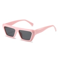 Retro rectangle sunglasses with pink frame and dark grey lenses in a 45-degree side view - Pink Frame Grey Lens