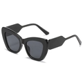 Occhiali da sole cat-eye oversize moderni con montatura nera e stanghette geometriche - Montatura Nera / Lenti Nere