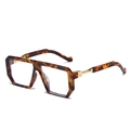 Square tortoise shell eyewear with golden metal temples and geometric oversized frames - Leopard Transparent Lens