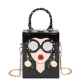 Quirky black patent leather box bag with cartoon face design and silk scarf handle - Black