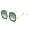 Sparkly green glitter oval sunglasses with wavy gold temples and gradient lenses - Green Frame Green Grey Lens