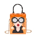 Quirky orange square box bag featuring a cartoon sunglasses character and silk handle - Orange